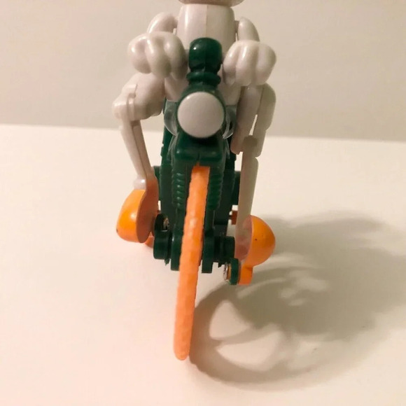 Halloween Plastic Skeleton Riding Bicycle Bike Lollipop Candy Holder Wind Up Toy - Picture 7 of 10